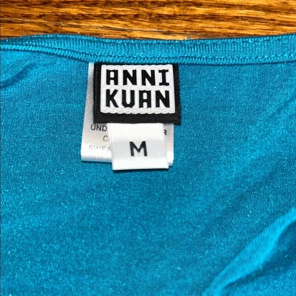 Anni Kuan - Elegant Teal Wrap Top - Picture 2 of 10